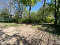 Hundeauslaufgebiet-Eingezäunte Freilauf Hundeplatz-Bild