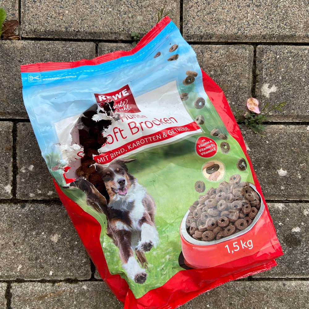 Giftköder-Ausgelegte offene Hundefutterpackung-Profilbild